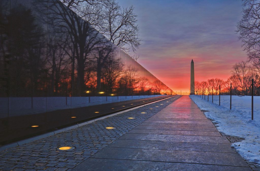 Vietnam Veterans Memorial with the view of Washington monument